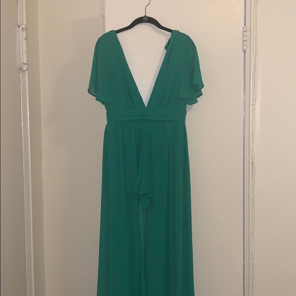 A peakaboo romper/maxi sheer, plunging jumpsuit